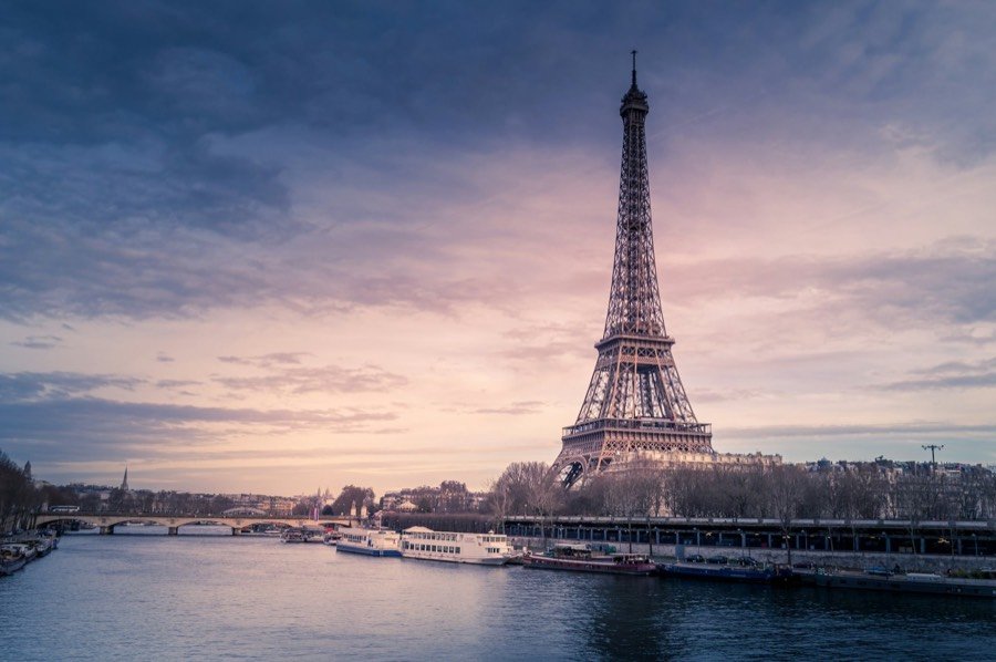 Eiffel Tower beside the River Seine at dusk
